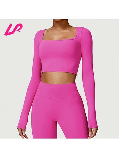 Our hot pink long sleeve crop top is the perfect balance of style and comfort. Made from high-quality materials, it's perfect for any occasion. Shop now and elevate your wardrobe.